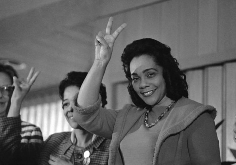 Coroetta Scott King, Wife of late Dr. Martin Luther King signals for victory over racial prejudice at conclusion of her address to Woman Power in Action for Peace Conference at Wisconsin University, Milwaukee  Nov. 22, 1969. She said women should be involved in the fight against poverty, racism and war. (AP Photo)