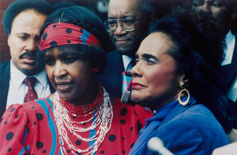 Winnie Mandela, left, wife of jailed African National Congress leader Nelson Mandela, is seen with Coretta Scott King, widow of American civil rights leader Dr. Martin Luther King, Jr., in Soweto, Sept. 11, 1986.  (AP Photo/Greg English)