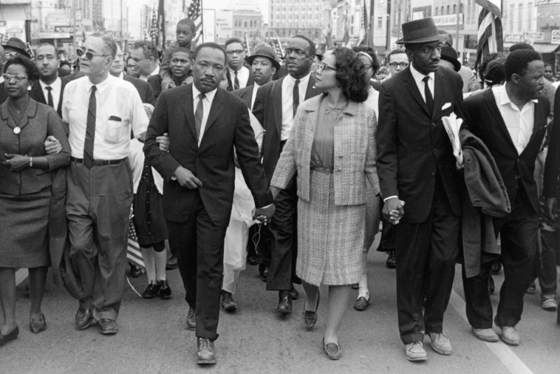 **ADVANCE FOR WEEKEND JUNE 7-8**This photo supplied by the High Museum of Art, shows Dr. Martin Luther King Jr. and his wife Coretta Scott King leading freedom marchers in Montgomery, Ala. in 1965, in a photo by Morton Broffman, which is part of one of two exhibits --this one at the High Museum of Art -- opening in Atlanta on Saturday,June 7, 2008,   focusing on the civil rights movement.(AP Photo/ High Museum of Art ,Gift of the Broffman Family,Morton Broffman)